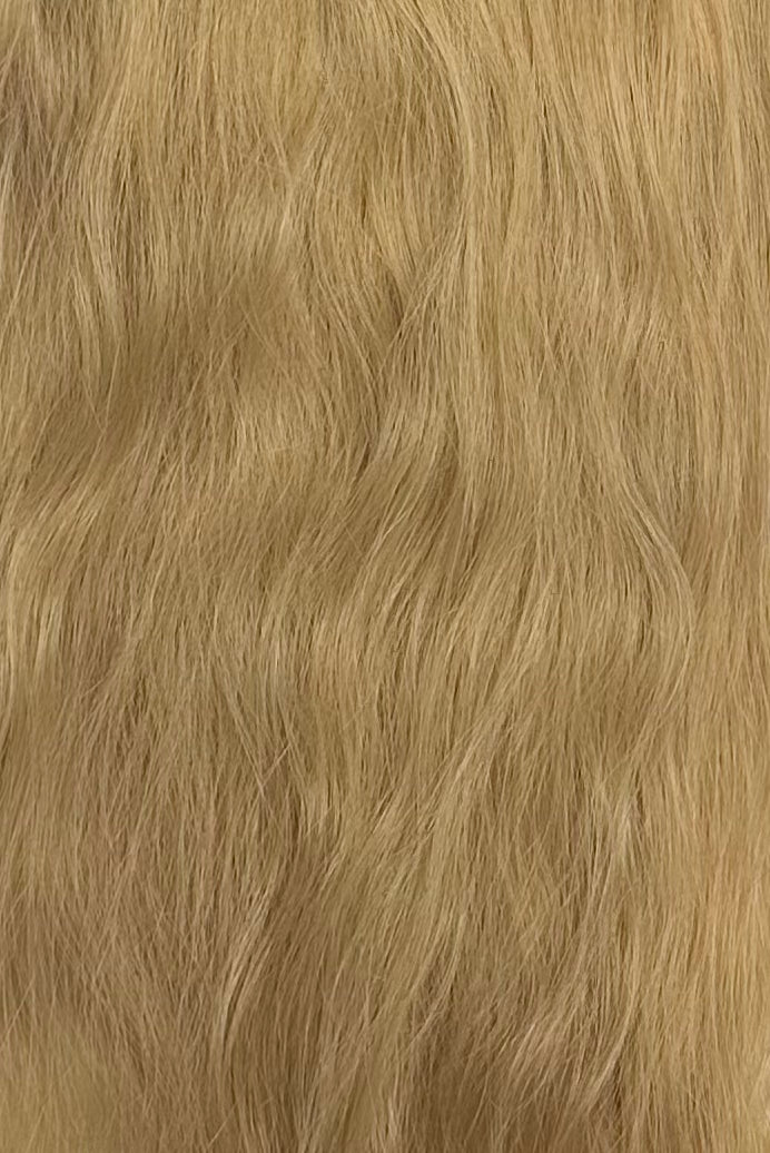 Close-up of blonde hair with wavy texture
